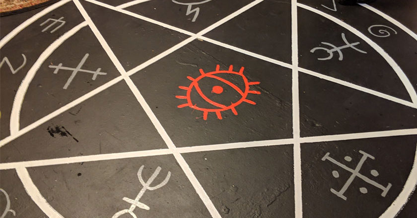 Pentagram painted on the floor of the Mystic Museum for the Occult exhibit