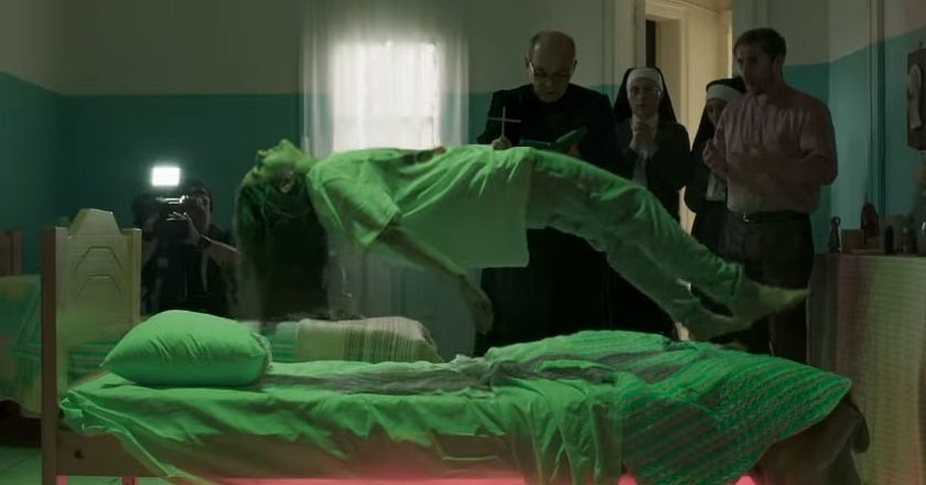 Scene with girl levitating off her bed in "Los Spookys"