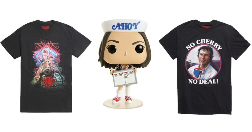 Two Stranger Things t-shirts and a Robin Pop! figure