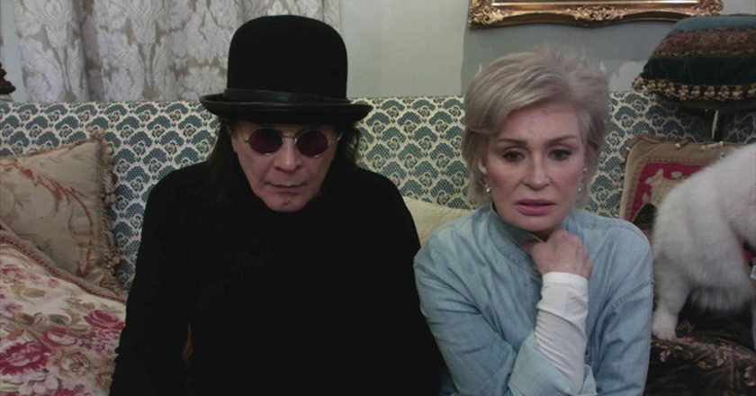 Ozzy and Sharon Osbourne watching an episode of Travel Channel's '"Portals to Hell"