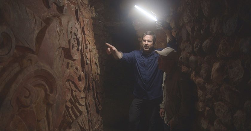 Host Don Wildman, in a Honduras underground tomb with archeologist David Sedat.