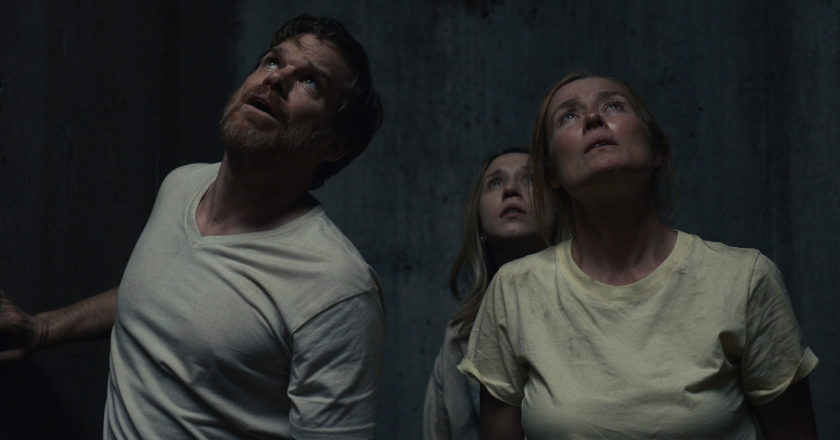 Michael C. Hall as “Brad,” Taissa Farmiga as “Laurie,” and Jennifer Ehle as “Anna” in Pascual Sisto’s JOHN AND THE HOLE.