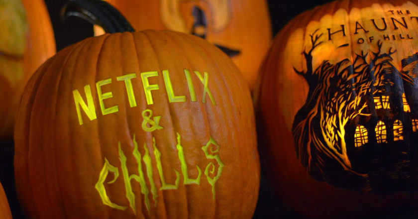 Jack-o-Lantern carved with the words "NEtflix & Chills"