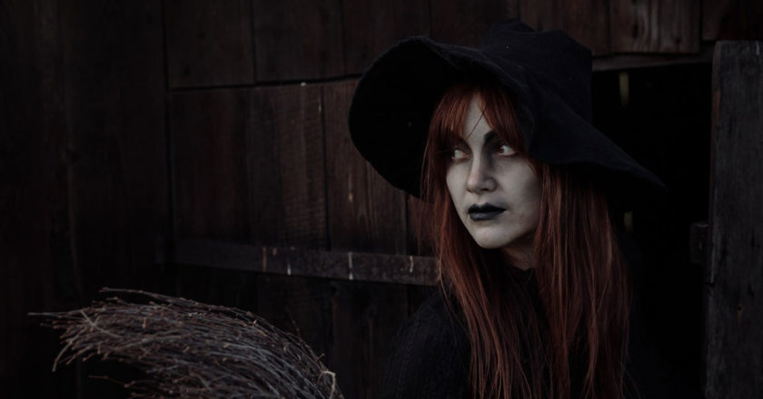 Young girl dressed as a witch