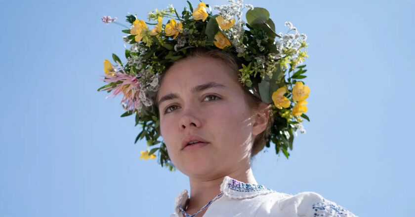 Florence Pugh as Dani wearing a flower crown in Midsommar