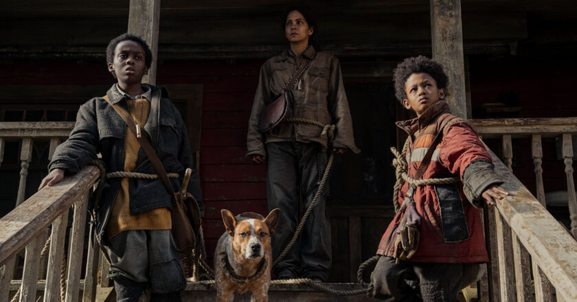 Halle Berry, Percy Daggs IV, and Anthony B. Jenkins stand on a porch tethered together by rope, in Never Let Go