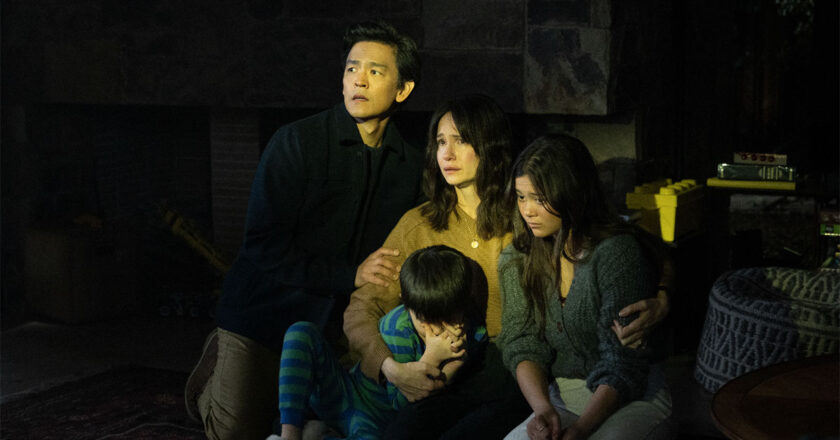 John Cho, Katherine Waterston, Lukita Maxwell, and Isaac Bae sit on the floor together in fear in "AFRAID"