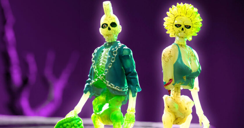 Zombie Suicide and Zombie Trash Monster Glow ReAction figures